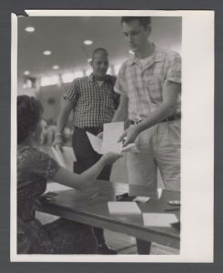 Registration - Student hands in form