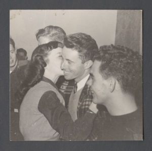 Students, groups, 1940s-1950s - Woman kisses Sigma Pi student on cheek