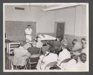 School of Medicine - Students observe patient in Glenn building of Grady Hospital