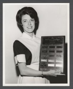 School of Nursing - Student nurse Carol Penland holding the Ruth C. Kelly award