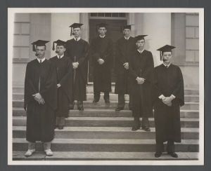 Woodrow Wilson Fellows - Group portrait of students in academic regalia with tobacco pipes