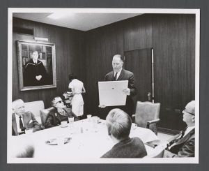 School of Nursing - Chair of the Emory Board of Trustees Henry L. Bowden holding award prior to presenting it to Nell Hodgson Woodruff