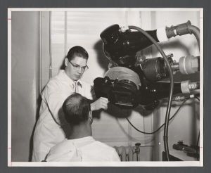 School of Medicine - Dr. Bryan Redd prepares machine for patient
