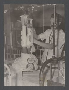 School of Medicine - Man bandages legs