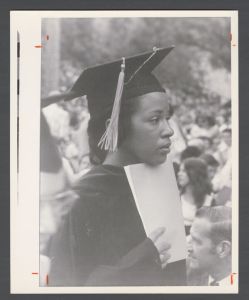 Commencement, 1970s and 1980s - Student holding program