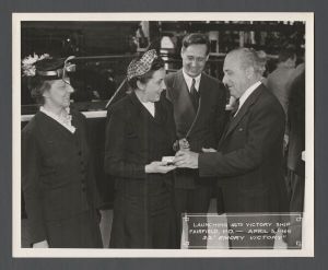Launch of Emory Victory, 1945 - Mrs. Cox presented with a pin