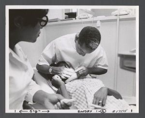 School of Dentistry - Dentist working with patient
