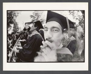 Commencement, 1970s and 1980s - Student smoking a cigar