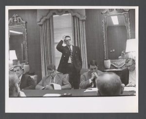 Faculty and staff, unidentified individuals - Group of men in a meeting