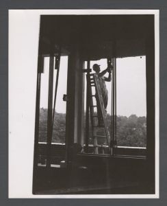 Dental School - Man working on building