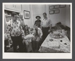 Students, groups, 1970s - Group portrait of six people in room with dog