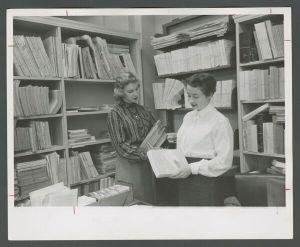 Library - Clerical staff, Ann Blumer and Mary Gilbert, working with serials