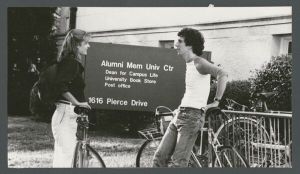 Alumni Memorial University Center - Two students conversing outside of building