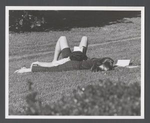 Students, groups, 1960s - Two students sunbathing in the grass