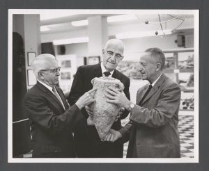 Museum - Dr. Woolsford B. Baker, Dr. Boone M. Bowen, and Dr. Immanuel Ben-Dor with a 2,500-year-old pottery jar