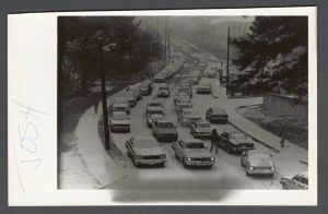 Unusual weather on campus - Cars driving in snow at dusk