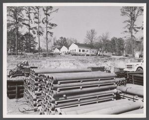Campus construction, 1940s-1960s - Stacked pipes