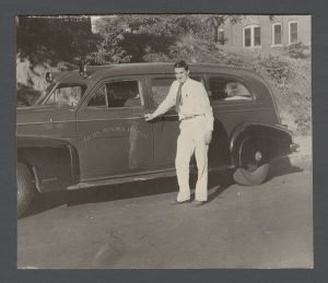 School of Medicine - Man in front of a Grady hospital ambulance