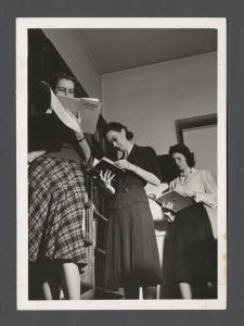 Students, classroom groups, 1960s - Three students reading books
