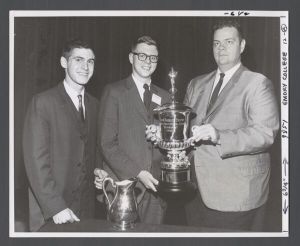 Faculty and staff, groups - Former Georgia State Senator and Director of the Emory debate team, Glenn Pelham presents the Alben Barkley trophy to Naylor and Koetl