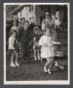 Easter egg hunt, May 1956 - Children begin the search