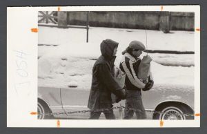 Unusual weather on campus - Students walking with groceries in the snow