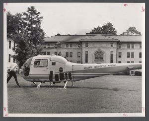 Aerial campus photographs - Jim McRae walks around helicopter