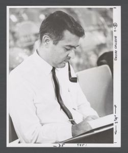 Debate Team - Sam Davis, a faculty member at Ball State University, recording a debate match score