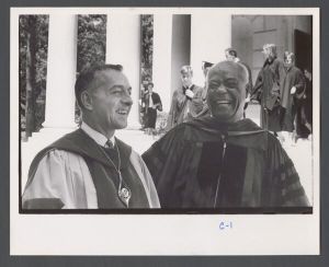 Commencement, 1970s - Emory President Sanford Atwood and faculty member laughing together