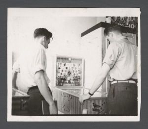 Students, groups, 1940s-1950s - Two men playing pinball