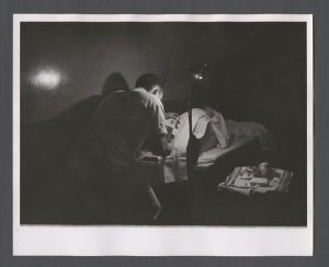 School of Medicine - Doctor working with patient
