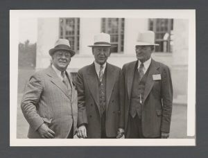Identified Speakers and Entertainers - University of Georgia officials, Bob Whitaker, Dr. M. L. Brittain, and Dr. Cox