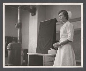 Department of Physical Medicine, 1940s-1950s - Nurse standing by desk