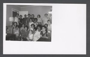 School of Nursing - Group portrait of international student nurses in living room