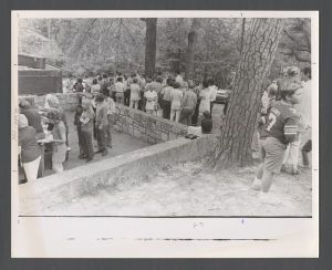 Students, groups, 1970s - People standing outside and getting food