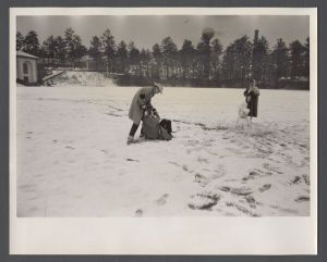 Unusual weather on campus - Two students play in the snow