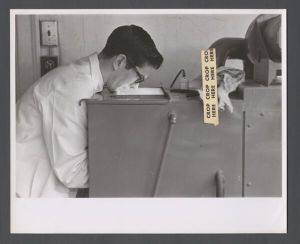 College of Arts and Sciences - Man working with lab equipment
