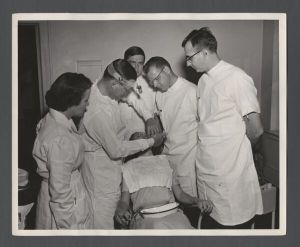 School of Dentistry, 1950s - Students observe dental procedure