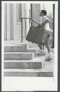 Residence halls - Student with suitcase