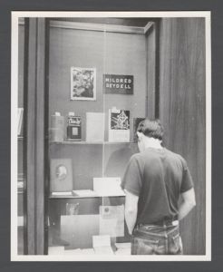 Library Special Collections - Student looking at display case