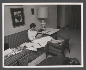 Students studying, 1960s - Student studying in dormitory lounge