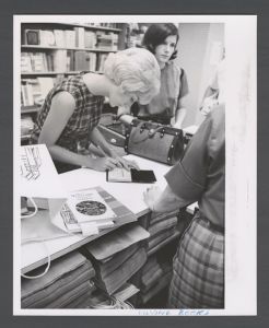 Freshman camp - Woman buying books from bookstore