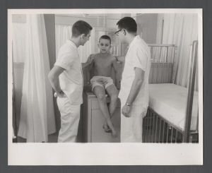 School of Medicine - Students examine boy