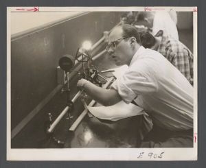 Students, groups, 1940s-1950s - Student experimenting in lab