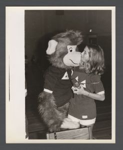 Students, groups, 1970s - Sorority member with mascot in a monkey costume