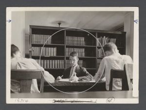Students, groups, pre-1940 - Men studying in the library