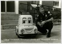 Cpl. K.R. Porter with RC Robot Patrol Car