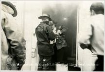 Fireman W.C. Purvis and Others in Burning Building