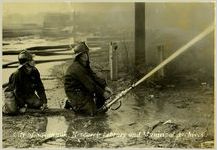 Firemen Operating Fire Hose
