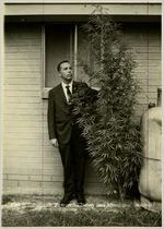 Man with Marijuana Plant